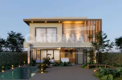 Maravilhosa casa à venda no condomínio villa lobos em paulínia com 4 suítes.