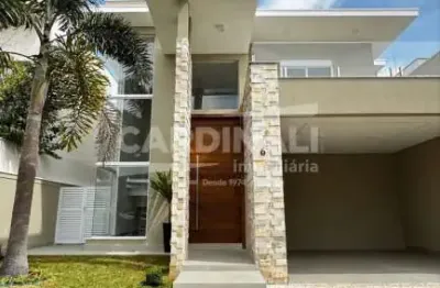 Casa à venda com 3 suítes e piscina no condomínio vevey no swiss park campinas.