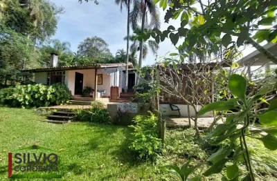 Casa em condomínio fechado com 3 quartos à venda na Rua Laurindo Januário da Silveira, 5110, Lagoa da Conceição, Florianópolis por R$ 2.000.000