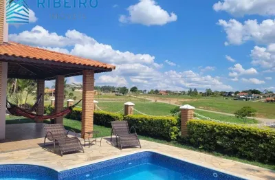 Bela casa de campo em condomínio com total infraestrutura