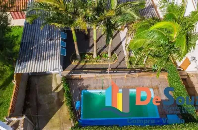 Imóvel  com piscina e pergolado  próximo ao centro de nova tramandai!