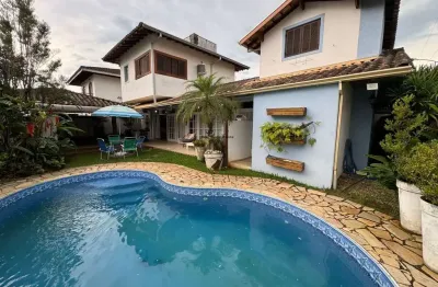 Casa com piscina e 4 dormitórios a venda no itaguá estuda imóvel de menor valor em ubatuba como parte de pagamento.