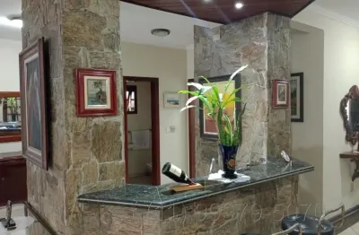 Bertioga-mansão 2 piscinas 4 suites 4 salas varanda casa caseiro