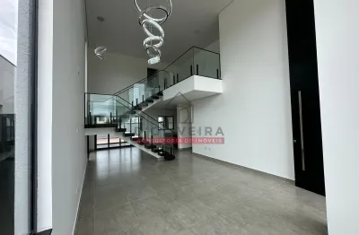 Sobrado com piscina e churrasqueira no condomínio flora rica - peruíbe - sp