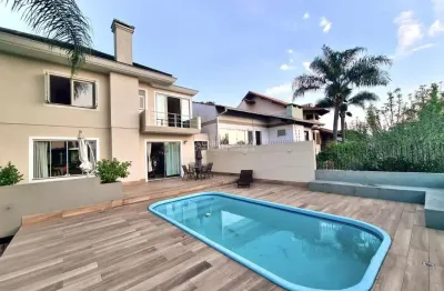 Casa de alto padrão em uma das ruas mais seguras de novo hamburgo no bairro jardim mauá: 4 dormitórios, 2 suites, 4 vagas, próximo ao parcão.