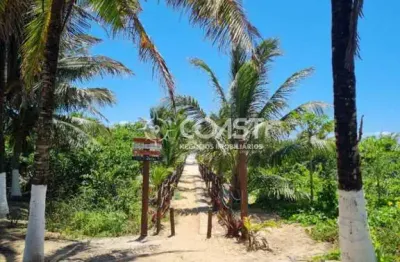 Vendo excelente casa com 3/4 em condomínio fechado em frente a praia
