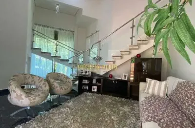 Sobrado à venda com 3 dormitórios, sendo 1 suíte com closet, área gourmet e piscina no condomínio aruã 1 - suzano-sp