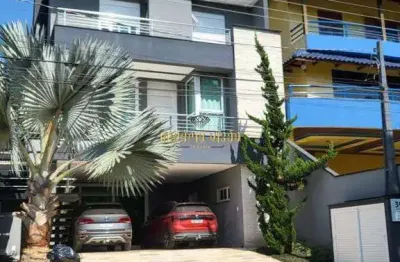 Sobrado de alto padrão à venda com 3 dormitórios e com elevador no condomínios aruã - mogi das cruzes - sp.