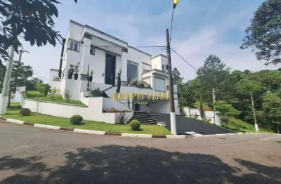 Mansão com 4 suítes máster, cinema, escritório, piscina e sauna; condomínio de luxo com segurança armada de frente com a rodovia airton senna-sp