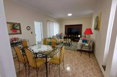 Casa térrea com salão comercial no centro de suzano-sp.