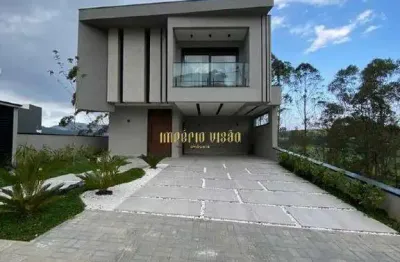 Casa de alto padrão à venda com 3 suítes, espaço gourmet e piscina com borda infinita no condomínio aruã brisas 2 - mogi das cruzes-sp