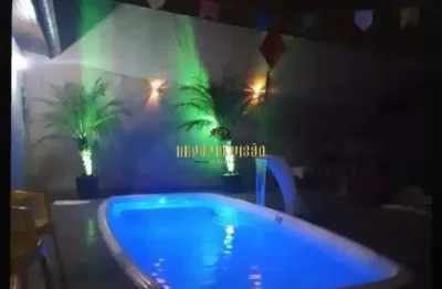 Casa térrea com 4 suítes e guarda roupas, piscina em poá sp