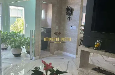 Casa à venda com 3 suítes, com uma piscina com cascata no condomínio aruã brisas em mogi das cruzes-sp