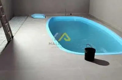 Casa nova em condomínio no balneário eliana a 03 quadras do mar
