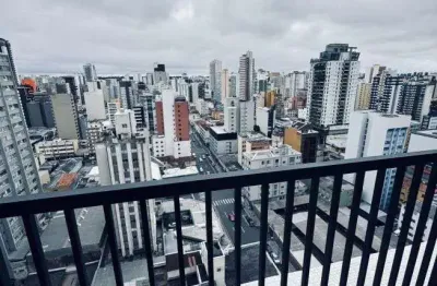 Studio com vaga de garagem em andar alto no centro de curitiba