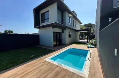 Sobrado na quinta dos açorianos em barra velha | semimobiliado | piscina, espaço, conforto e qualidade a 150m da lagoa e 250m do mar! venha conhecer!