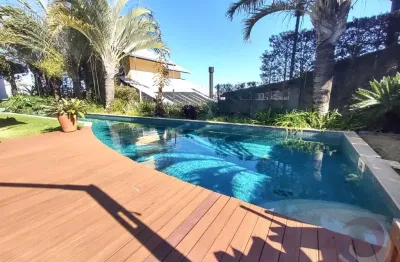 Casa em condomínio fechado com 4 quartos à venda no Cacupé, Florianópolis 
