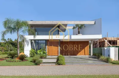 Casa à venda no bairro condomínio reserva das águas - torres/rs