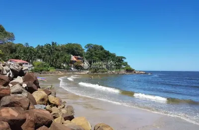 Terreno à venda na Avenida Vinte e Nove de Abril, 01, Prainha, Guaratuba, 416 m2 por R$ 665.600