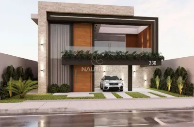 Casa duplex à venda em condomínio com 3 suítes e 4 vagas de garagem.