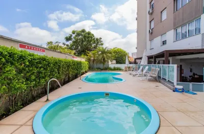 11° , de frente, com vista perene e sol da manhã, este apartamento de 2 dormitórios possui amplo living, cozinha americana com churrasqueira e área de serviço.