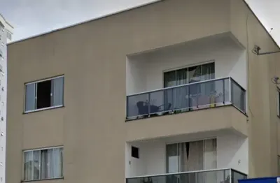 Proximo a univali no centro! apartamento de 1 suite + 2 dormitórios c/ vaga de garagem e sacada