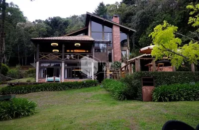 Casa em condomínio para venda com 4 quartos, sendo 3 suítes, 630m²