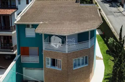 Casa em condomínio para venda com 5 quartos, sendo 4 suítes, 370m²