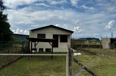 Terreno com chalé em bom estado no loteamento arroio grande
