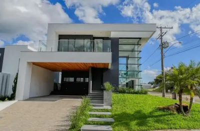 Casa em condomínio fechado com 3 dormitórios, lareira e vista panorâmica