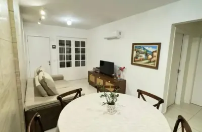 Apartamento no centro andar alto, sol manhã, 2 garagens e 2 quartos