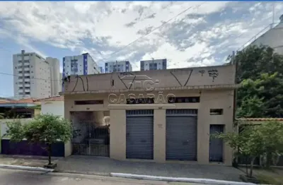 Terreno 10 x 40 - 400m2 com 4 casas e + salão comercial na frente