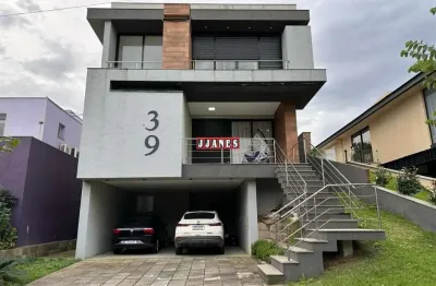Casa em condomínio fechado com 3 quartos à venda na tapir rocha, 8500, condomínio buena vista, viamão por r$ 1.690.000