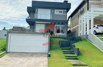 Casa em condomínio fechado com 3 quartos à venda na rodovia tapir rocha, 8500, condomínio buena vista, viamão por r$ 1.820.000