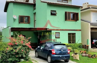 Casa em condomínio fechado com 3 quartos à venda na tapir rocha, 8500, condomínio buena vista, viamão por r$ 900.000