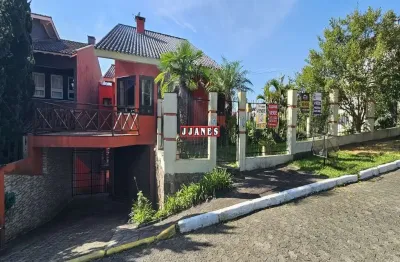 Casa em condomínio fechado com 4 quartos à venda na rua peroba, 127, cantegril, viamão por r$ 2.100.000
