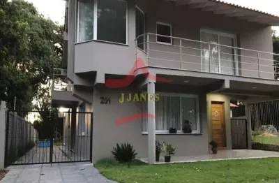Casa em condomínio fechado com 3 quartos à venda na rua cipreste, 201, cantegril, viamão por r$ 990.000