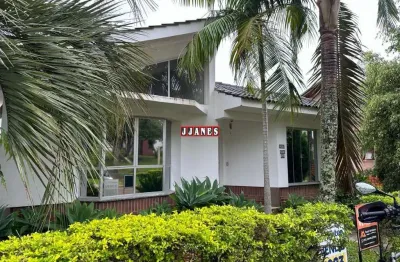 Casa em condomínio fechado com 3 quartos à venda na rua pau brasil, 269, cantegril, viamão por r$ 970.000