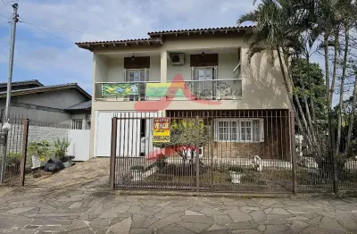 Casa com 3 quartos à venda na rua pinto bandeira, 328, viamópolis, viamão por r$ 950.000