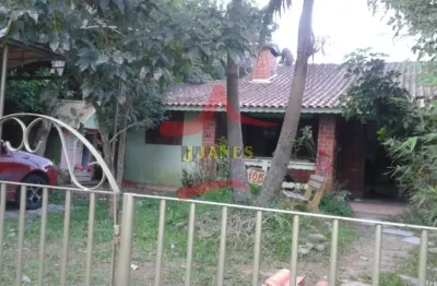 Casa em condomínio fechado com 4 quartos à venda na rua caroba, 105, cantegril, viamão por r$ 290.000