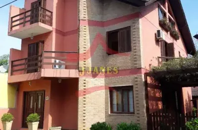 Casa com 5 quartos à venda na rua pinheiros, cantegril, viamão, 260 m2 por r$ 1.469.000