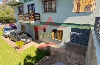 Casa com 4 quartos à venda na Rua Açores, Tarumã, Viamão, 350 m2 por R$ 1.000.000