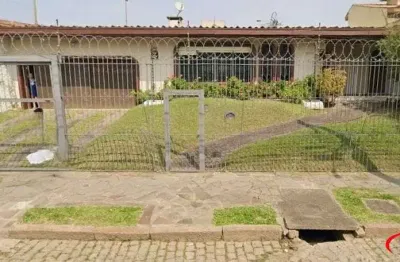 Casa com 4 quartos à venda na Rua Jacipuia, 201, Guarujá, Porto Alegre