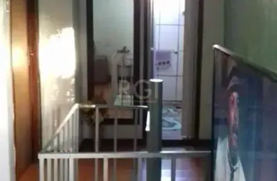 Casa com 4 quartos à venda na Beco dos Rossatos, 65, Campo Novo, Porto Alegre