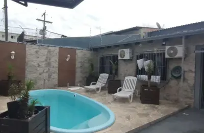 Casa no bairro restinga com piscina com 4 dormitórios