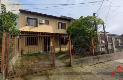 Casa com 4 quartos à venda na Rua Doutor Cláudio Walter Ferreira da Silva, 191, Guarujá, Porto Alegre