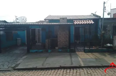 Casa com 3 quartos à venda na Acesso G, 621, Restinga, Porto Alegre