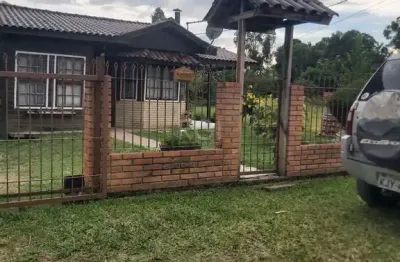 Casa com 2 quartos à venda na Avenida Figueira, 374, Tarumã, Viamão