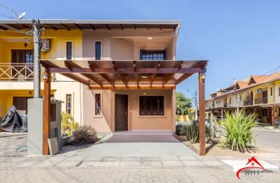 Casa em condomínio fechado com 3 quartos à venda na Avenida Edgar Pires de Castro, 1286, Hípica, Porto Alegre