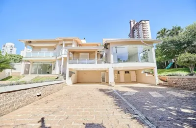 Residência de alto padrão - 480m² | 3 suítes | 08 vagas | terreno de 1.072m²